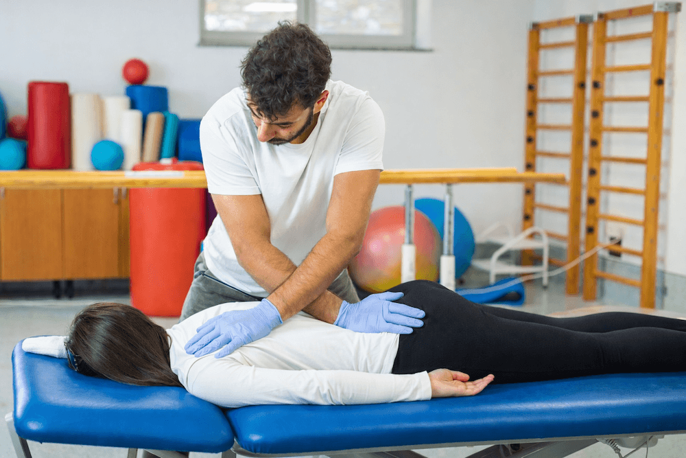 Physiotherapy session with sciatica expert